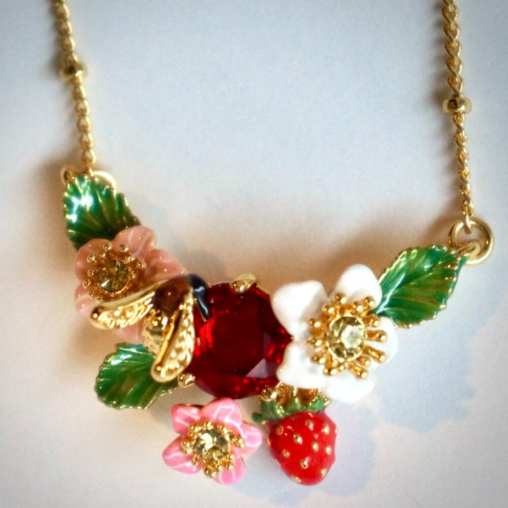 Necklace with flowers, wild strawberries and red stone